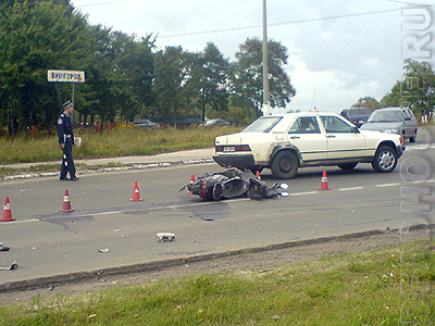 The corpse of a motorcyclist