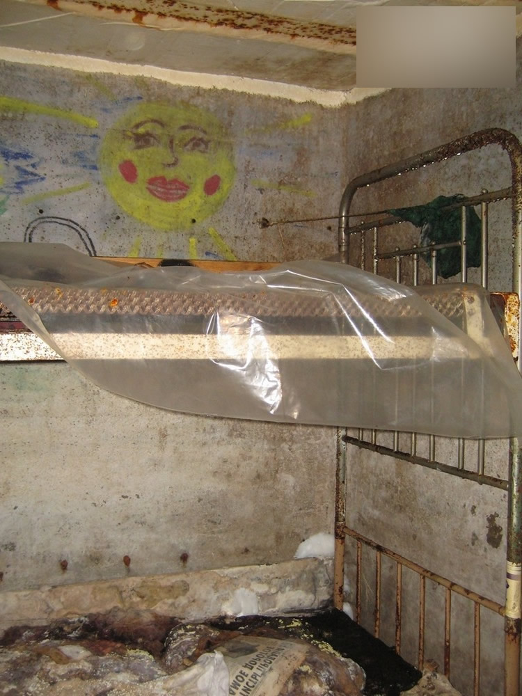 Two-tiered bunks in the prison bunker where the abducted girls were kept