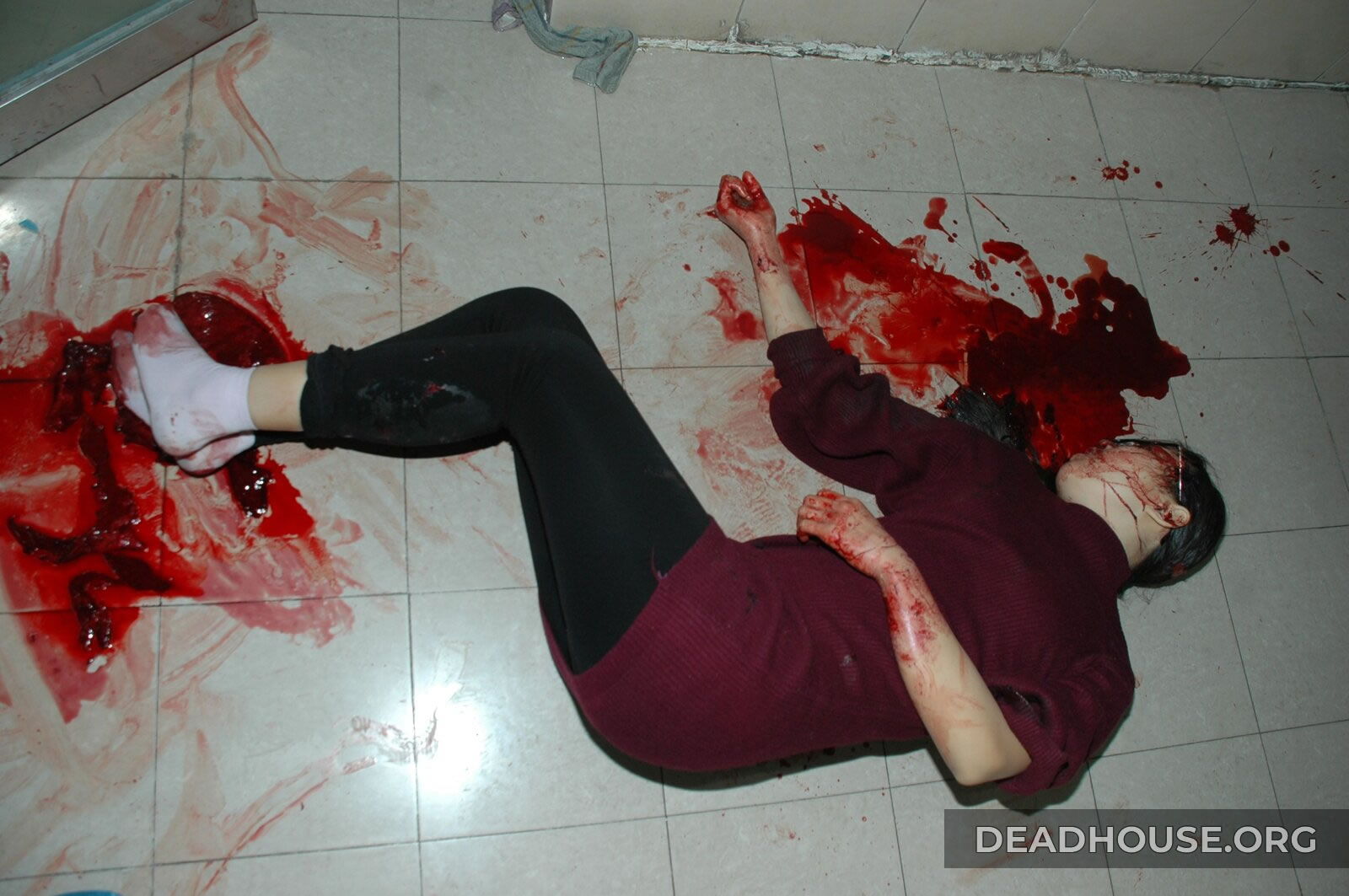 Corpse of a beautiful girl covered in blood