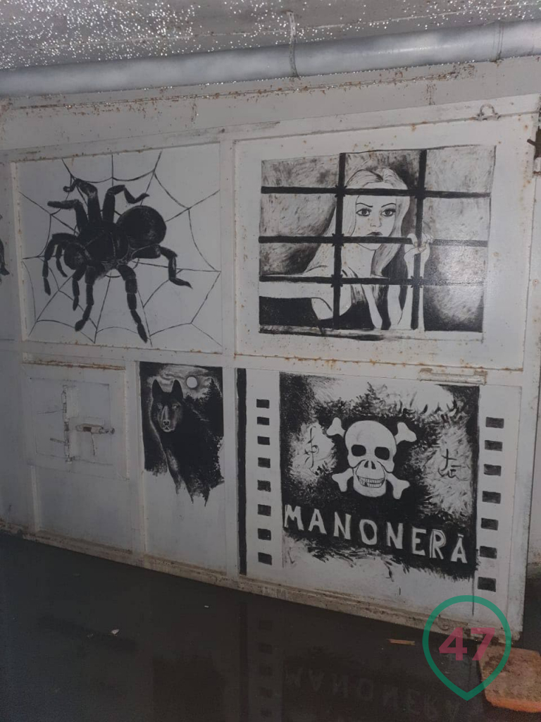 Graffiti on the walls of an underground prison
