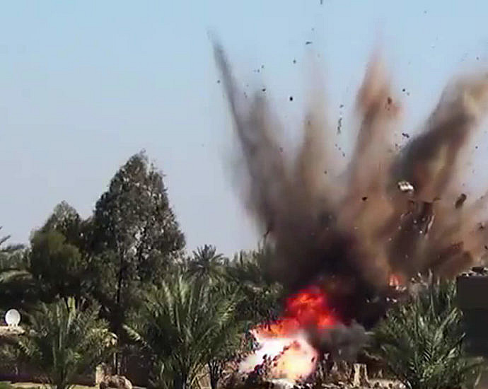 ISIS terrorists blow up cars of infidels