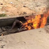 African justice. Thief burned alive