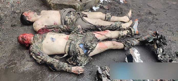 The corpses of people in uniform, probably the Russian army
