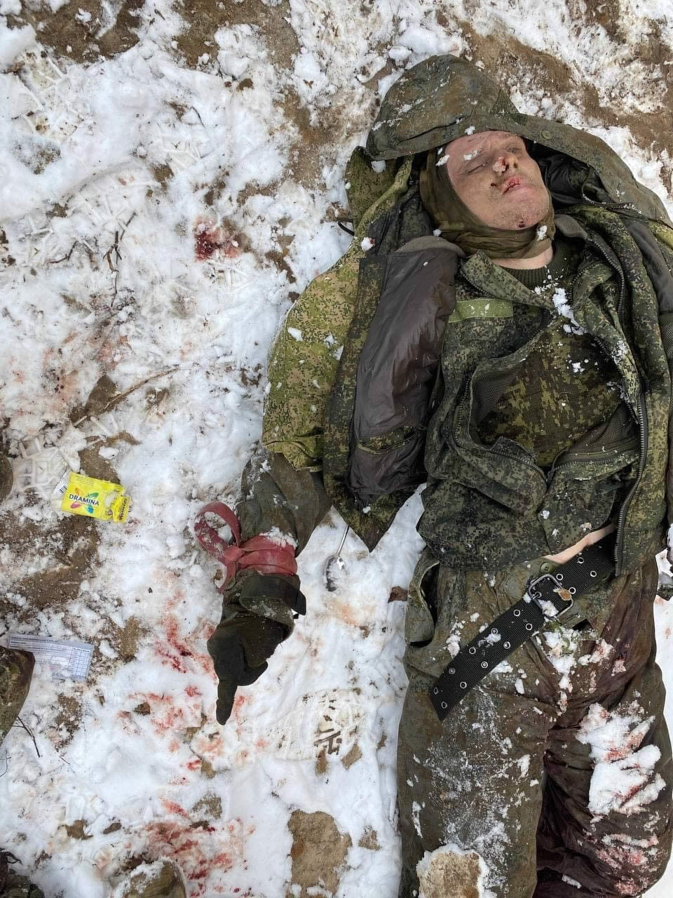 The corpse of a Russian military man in the snow. Ukraine