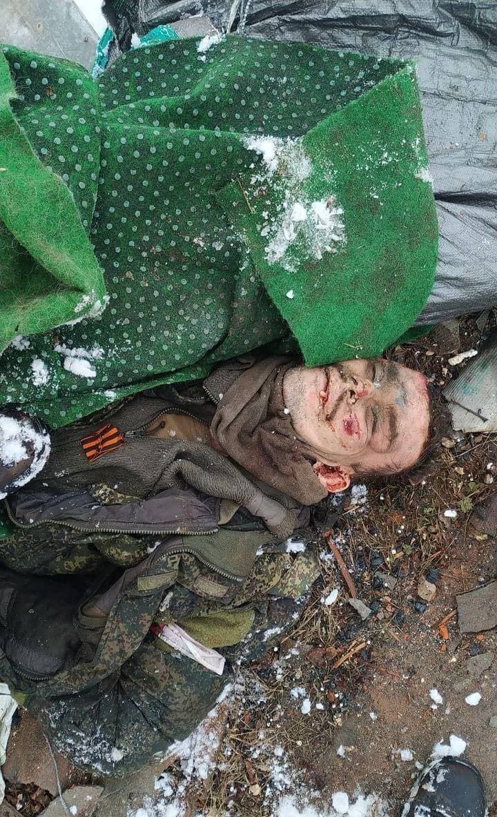 Corpse of Russian soldier with St. George ribbon