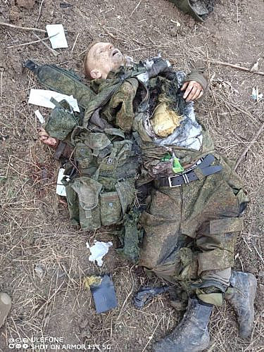 The corpse of a Russian soldier with a pierced body armor