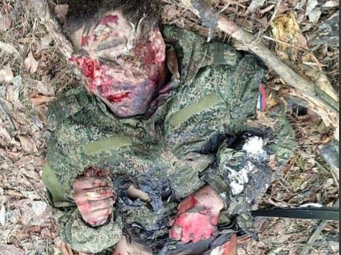 Bloody corpse of a Russian junior sergeant