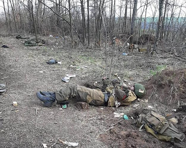 Corpse of a Russian soldier in a forest belt