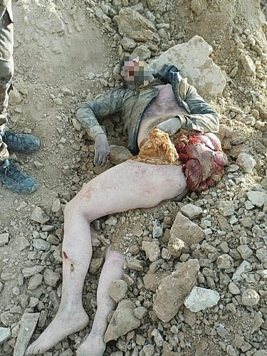 The corpse of a Russian military man with a severe injury