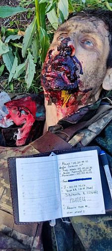 The corpse of a Russian military man with a posthumous note